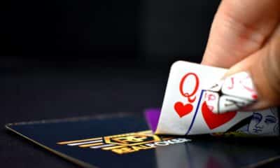 selective focus photography of queen of hearts playing card