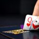 selective focus photography of queen of hearts playing card